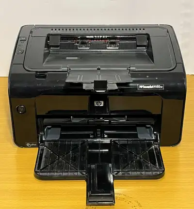 Imprimante au Lasar / Laser Printer Monochrome Sans fil / Wireless Aura bientôt besoin de cartouche...