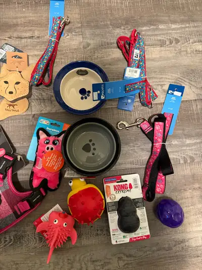 Over 12 dog supplies, includes leash coller, bowls, $69 harness, kong and 5 toys. $100 obo