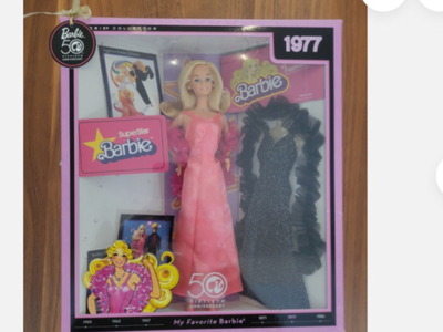 This SuperStar Barbie Doll is a 50 th Anniversary doll and is in great condition.Box has been opened...
