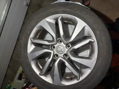 Four all-season tires and wheels of a Honda Accord LX are for sale. They are used but in good condit...