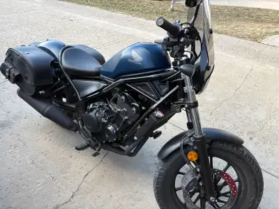 Great bike, great condition, added saddle bags and windshield less than 4000km