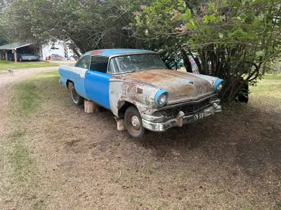 56 ford custom line 2 dr ht $1800 no power train. also have lots of 56 ford and meteor parts for sal...