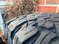2 mickey thompson tires and 2 K02 tires