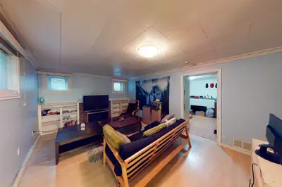 Room for rent in spacious three bedroom basement suite