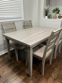 Ashley dinning table with four chairs 