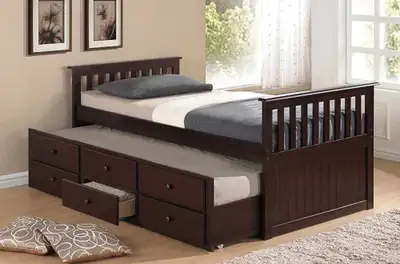 This is a used, but well-maintained twin-size trundle bed, perfect for accommodating guests or for k...