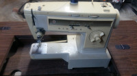 SINGER SEWING MACHINE with cabinet