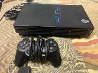 Sony PlayStation 2 console and remote