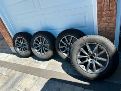 * WILL NOT FIT NEW GENERATION RX * Set of four 235/65/R18 Michelin X-ice Snow SUV tires mounted on o...