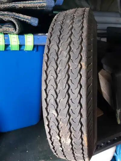 Used and new trailer tires 25 each 13 rim aluminum tires 30 for both new trailer tire on rim never u...