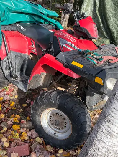 500 Polaris Sportsman works good. I have papers