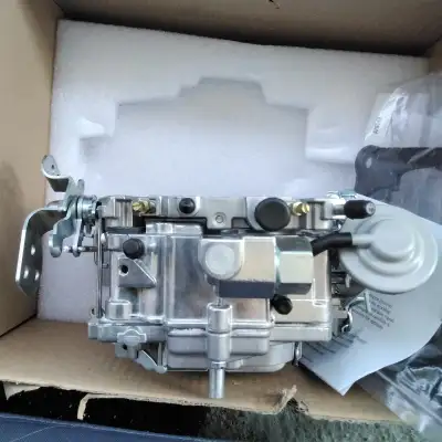SELLING A BRAND NEW 4 BERAL CASE ROCHESTER QUADRAJET 408 SERIES FOR OLDER V8 CHEVY AND GM VIECHELES...