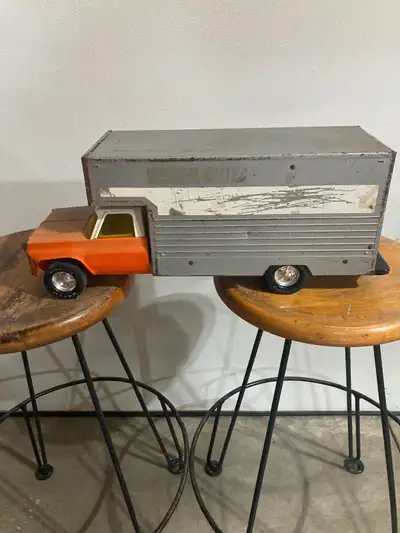 A great steel toy from the 1970’s. Missing the front grill and roll-up rear door is partially missin...