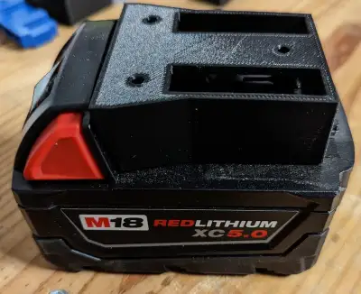 This is a wall mount/belt mount system for the Milwaukee M18 Batteries that allows them to clip in a...