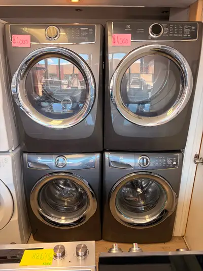 Beautiful Electrolux front-load washer and dryer set in a modern grey finish. Sleek design with larg...