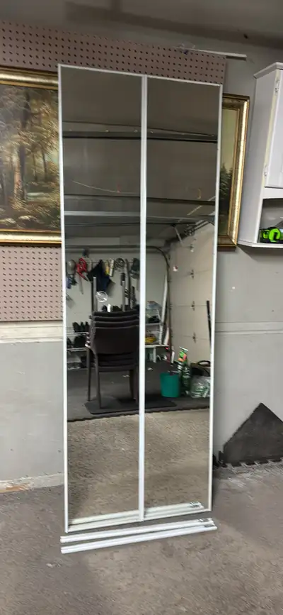 Coat closet mirrored folding doors, View more