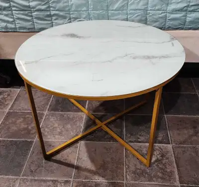 Brand NEW glass top white marble appearance and gold frame coffee table from Goldfan There is a pain...