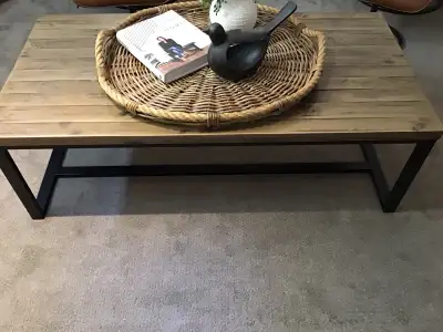 Farmhouse style coffee table( wood top and black metal legs)., View more