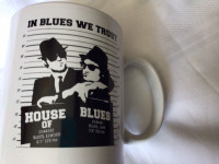 “In Blues we Trust”  House of Blues mug.