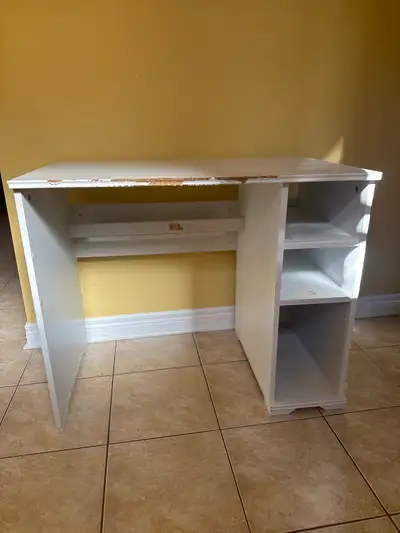 Ikea desk for free. Pick up only! Very sturd, minor paint peeling at front. Holds power bar at back.