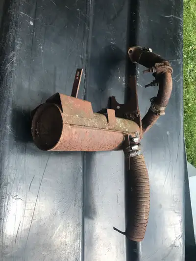 Snow cruiser exhaust $60 Omc opposed exhaust. Needs repair $40 Idler wheels- $5 each Clutches $30, $...