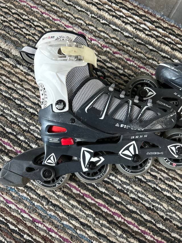 Firefly in-line skates. “Rollerblades” kid’s adjustable 29-30  in Skates & Blades in Calgary