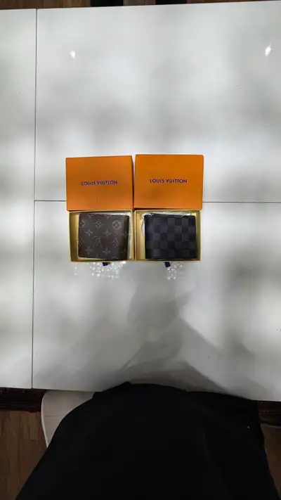 LV wallets comes with its box brand new