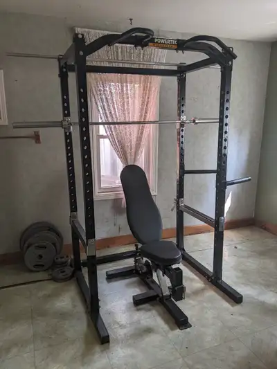 Squat Rack Flat / Incline adjustable bench Pull-Up Bar Dip Bars Olympic Plate 300 Lbs Set (w/ Barbel...