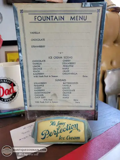 Rare Perfection Ice Cream menu display from an old soda fountain from the 40's or earlier. Stands ap...