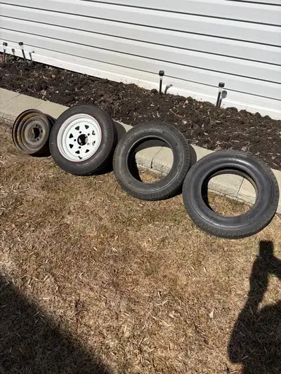 2- 5 bolt 12” rims Black rim still available 1- 5.30 x 12” tire 2- 4.80 x 12” tires. Sold Black rim...