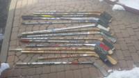 Many Player Wooden/Composite Hockey Sticks