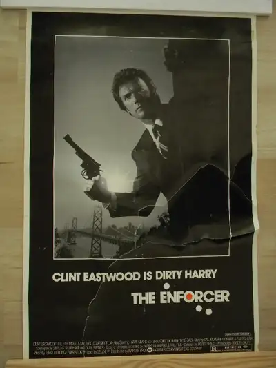 Movie poster: "The Enforcer" - Dirty Harry; size 23 x 35 inches. Fair condition. Has been ripped and...