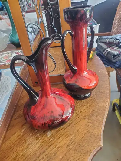 Red and black Evangeline pottery pitcher, View more