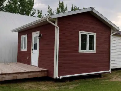Small building on metal I beams. Ready to be moved. 14ft x 20ft. Sided with KWP siding. Building was...