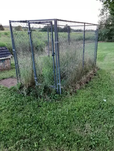 Galvanized Outdoor Dog Kennel for sale The kennel is aprox 4ft x 12 ft in size and it comes with a d...
