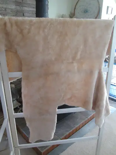 piece of cream fluffy material (25 x 39), View more