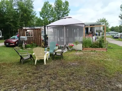 Has a 10x20 sun room with screened windows. View of the lake. Two fridges, 2 pull out sofas, 10x10 t...