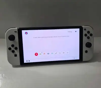 Nintendo switch OLED Model in good shape no issues, comes with you're genuine Nintendo joy cons only...