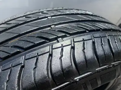 two Hercules Roadtour 215/65R17 (99T) All Season Tires. Plus two Goodyear all season tires. They are...