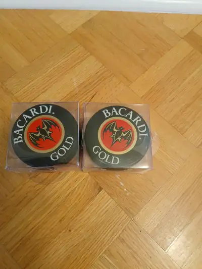2- Bacardi Gold promotional official hockey pucks- new, View more