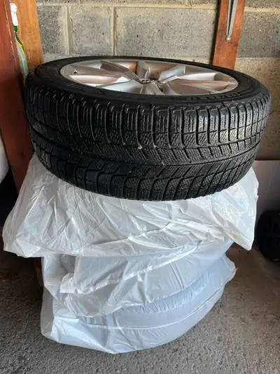 Premium Michelin X-Ice winter tires for Audi A4 on rims. Good condition, driven occasionally for few...