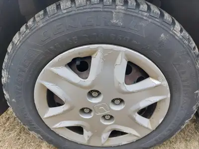 4 General Altimax Artic tires on rims off 2004 Honda civic 4 bolt pattern. Tire size 185/65/R14. Per...