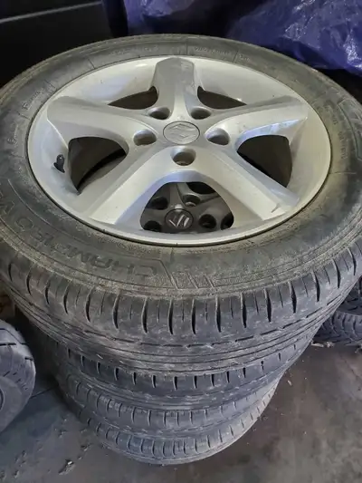 Suzuki rims. Rubber is no good.