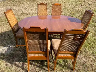 Circa 1960's built by Canada's best Manufacturer Gibbards Cherry wood table with six cane back chair...