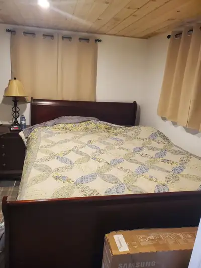 For Sale I have a Cherry Wood Queen size bed frame with matching night table for sale in excellent c...