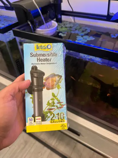 Thinking of getting another tank but change of plan. Tetra submersible heater maintains water temper...