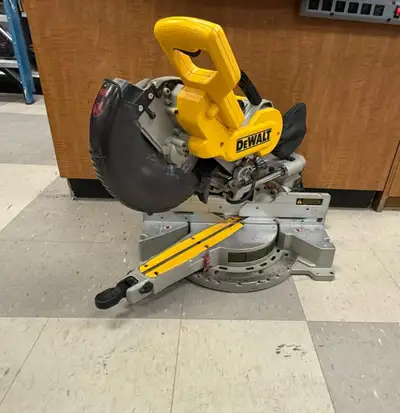 DEWALT DW717 Dual-Bevel Sliding Mitre Saw, 10-in - $449 Our price: $449 + tax (Please mention this a...