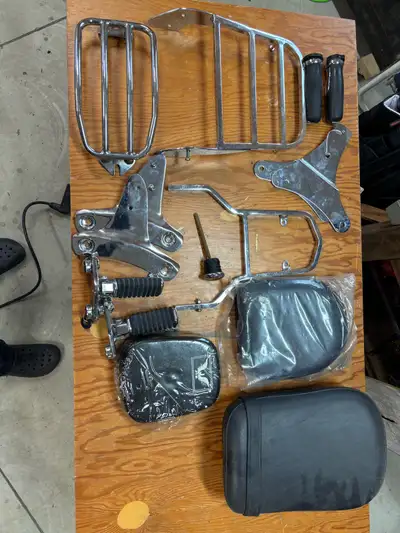 Passenger seat, luggage racks, back rest with pads, original grips, original rider pegs, oil dipstic...