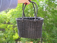 Black wicker purse with drawstring liner