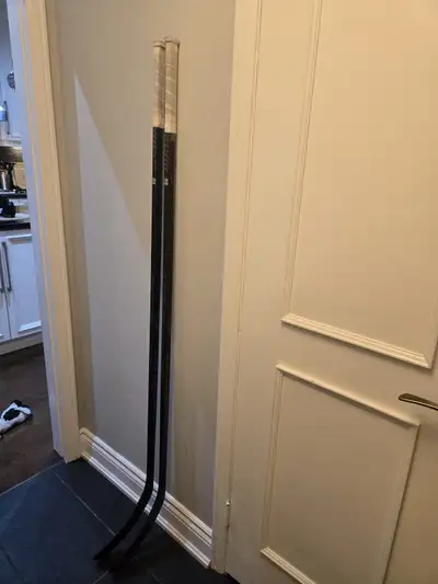 2 hockey sticks of Wariors pro, View more